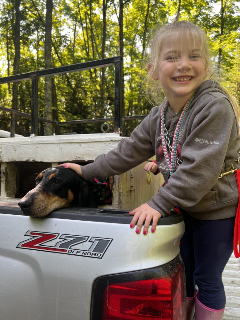February 2023 | Nick Sperberg | First Hound Dog | Our girl Addie with her first hound dog Sully