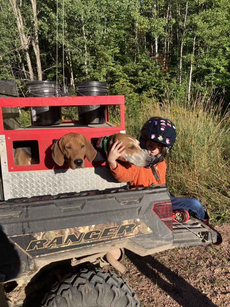 April 2025 | Zach Roggenbuck | A girl and her puppies | Taking my daughter out hunting for the day on the side by side with her favorite dogs.