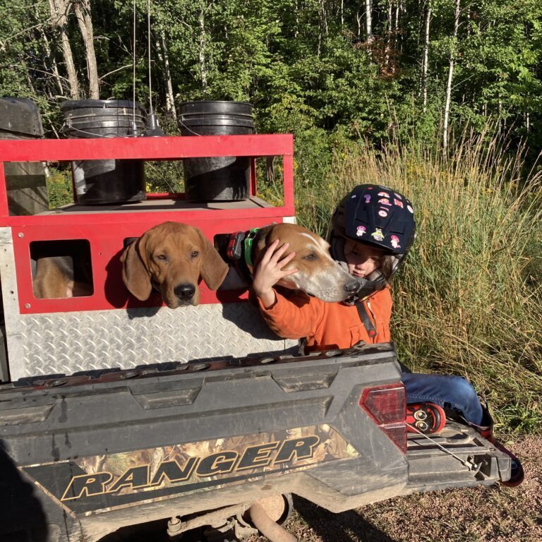 April 2025 | Zach Roggenbuck | A girl and her puppies | Taking my daughter out hunting for the day on the side by side with her favorite dogs.